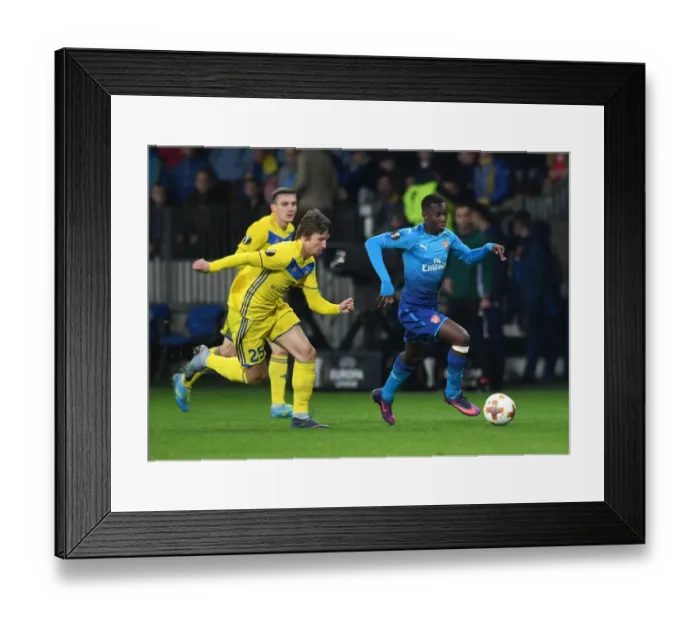Framed Print : Nketiah vs Baga: A Europa League Battle at Borisov-Arena Framed Print : Nketiah vs Baga: A Europa League Battle at Borisov-Arena