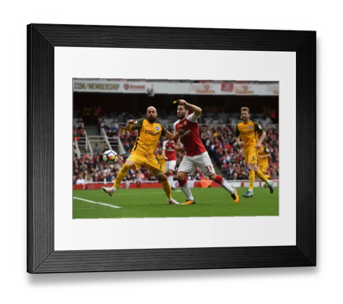 Framed Print : Arsenal's Sead Kolasinac Clashes with Brighton's Bruno Saltor in Premier League Showdown Framed Print : Arsenal's Sead Kolasinac Clashes with Brighton's Bruno Saltor in Premier League Showdown