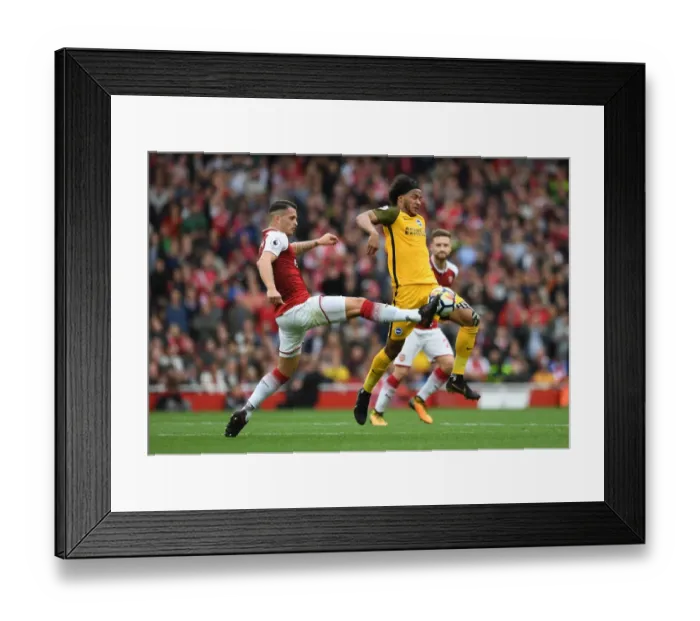 Framed Print : Arsenal vs Brighton: Xhaka and Brown Clash in Premier League Showdown