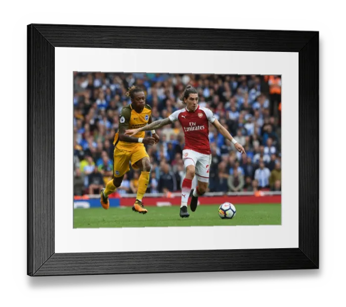 Framed Print : Arsenal's Lacazette Clashes with Bong in Premier League Showdown Framed Print : Arsenal's Lacazette Clashes with Bong in Premier League Showdown