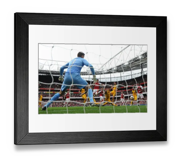 Framed Print : Nacho Monreal Scores the Winner: Arsenal vs Brighton & Hove Albion, Premier League 2017-18
