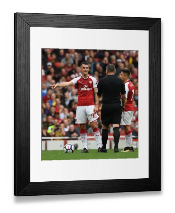 Framed Print : Xhaka and Referee Share a Light-Hearted Moment Amidst Arsenal's Battle Against Brighton