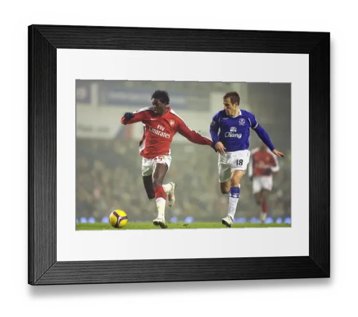 Framed Print : Emmanuel Adebayor (Arsenal) Phill Neville (Everton) Framed Print : Emmanuel Adebayor (Arsenal) Phill Neville (Everton)