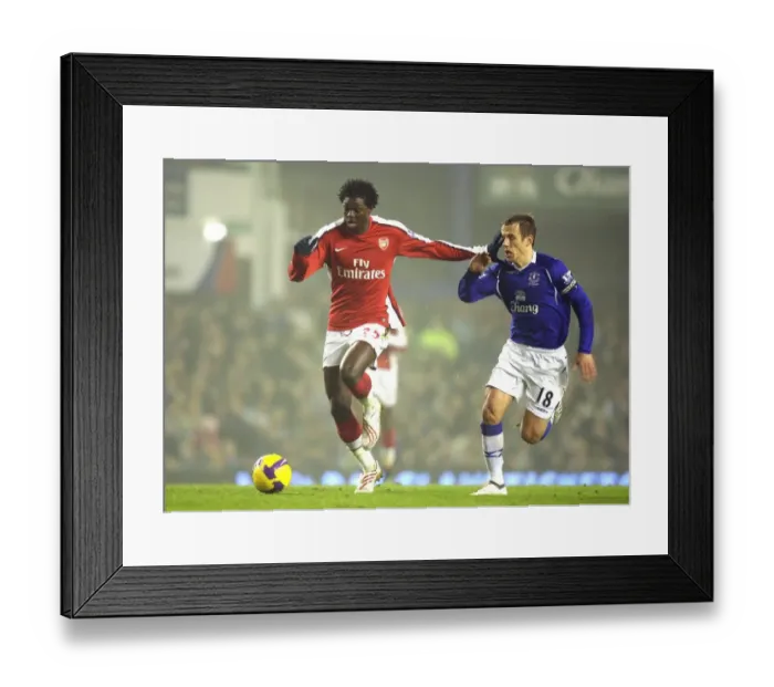 Framed Print : Emmanuel Adebayor (Arsenal) Phil Neville (Everton) Framed Print : Emmanuel Adebayor (Arsenal) Phil Neville (Everton)