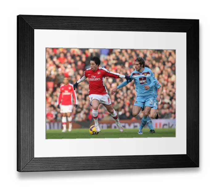 Framed Print : Arsenal vs. West Ham United: A Battle of Midfielders - Nasri vs. Behrami, Emirates Stadium, 31 / 1 / 2009 Framed Print : Arsenal vs. West Ham United: A Battle of Midfielders - Nasri vs. Behrami, Emirates Stadium, 31 / 1 / 2009