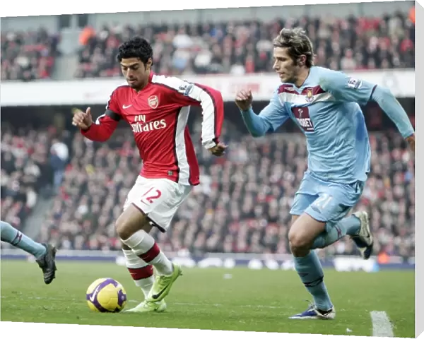 Carls Vela (Arsenal) Valon Behrami (West Ham)