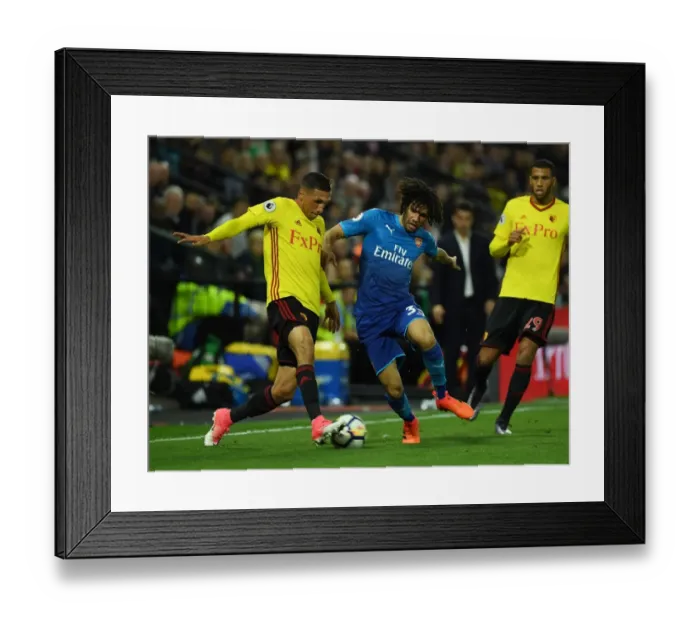 Framed Print : Clash at Vicarage Road: Mohamed Elneny vs Jose Holebas - A Premier League Battle Framed Print : Clash at Vicarage Road: Mohamed Elneny vs Jose Holebas - A Premier League Battle