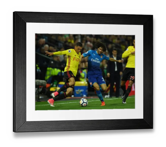 Framed Print : Clash at Vicarage Road: Mohamed Elneny vs. Jose Holebas - A Premier League Battle