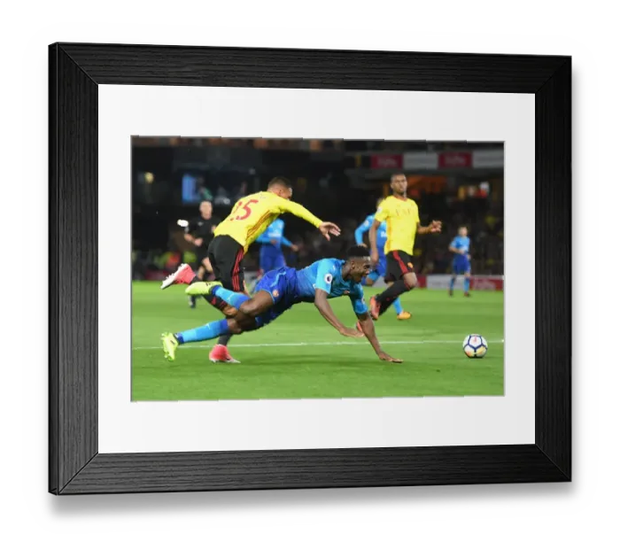 Framed Print : Welbeck vs. Holebas: A Premier League Battle at Vicarage Road
