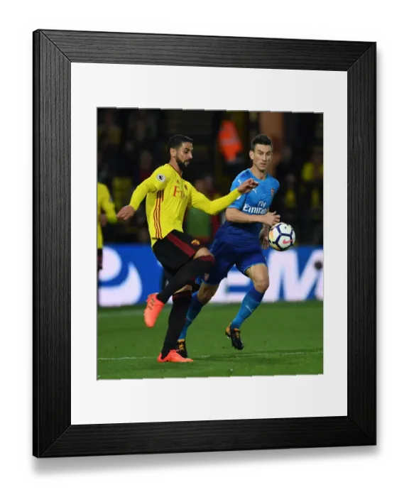 Framed Print : Clash of Titans: Koscielny vs Britos in the Premier League Battle between Watford and Arsenal Framed Print : Clash of Titans: Koscielny vs Britos in the Premier League Battle between Watford and Arsenal