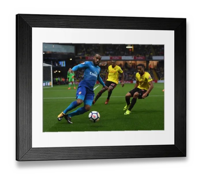 Framed Print : Clash at Vicarage Road: Lacazette vs. Mariappa Framed Print : Clash at Vicarage Road: Lacazette vs. Mariappa