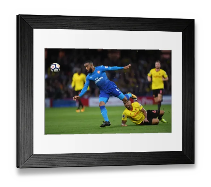 Framed Print : Alexandre Lacazette's Slick Move: Outmaneuvering Adrian Mariappa in the Arsenal vs. Watford Premier League Clash (2017-18) Framed Print : Alexandre Lacazette's Slick Move: Outmaneuvering Adrian Mariappa in the Arsenal vs. Watford Premier League Clash (2017-18)
