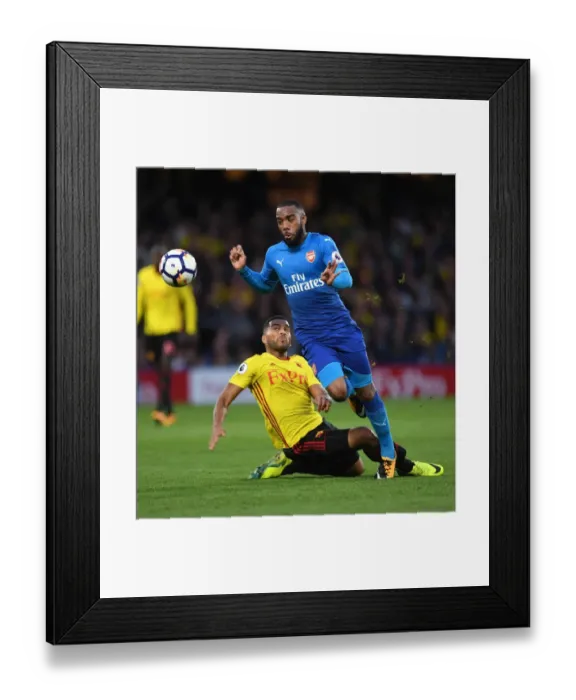 Framed Print : Alexandre Lacazette's Slick Move: Outmaneuvering Adrian Mariappa in Arsenal's Victory over Watford (2017-18) Framed Print : Alexandre Lacazette's Slick Move: Outmaneuvering Adrian Mariappa in Arsenal's Victory over Watford (2017-18)
