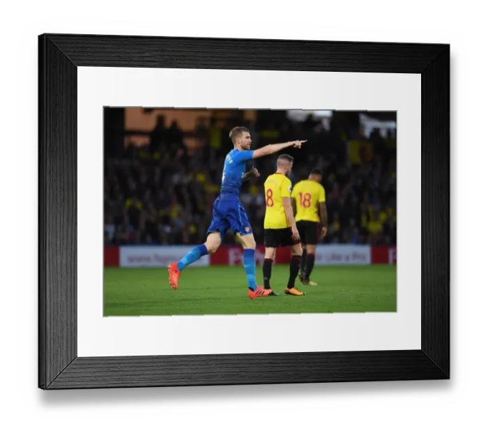 Framed Print : Per Mertesacker's Shocking Goal: Arsenal's Victory at Watford (2017-18)