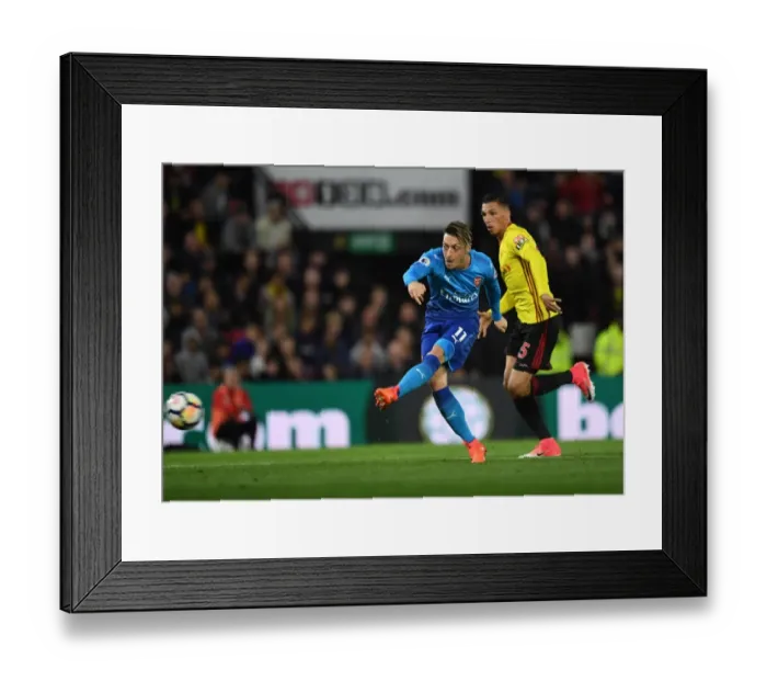 Framed Print : Mesut Ozil (Arsenal) Jose Holebas (Watford). Watford 2: 1 Arsenal. Premier League Framed Print : Mesut Ozil (Arsenal) Jose Holebas (Watford). Watford 2: 1 Arsenal. Premier League