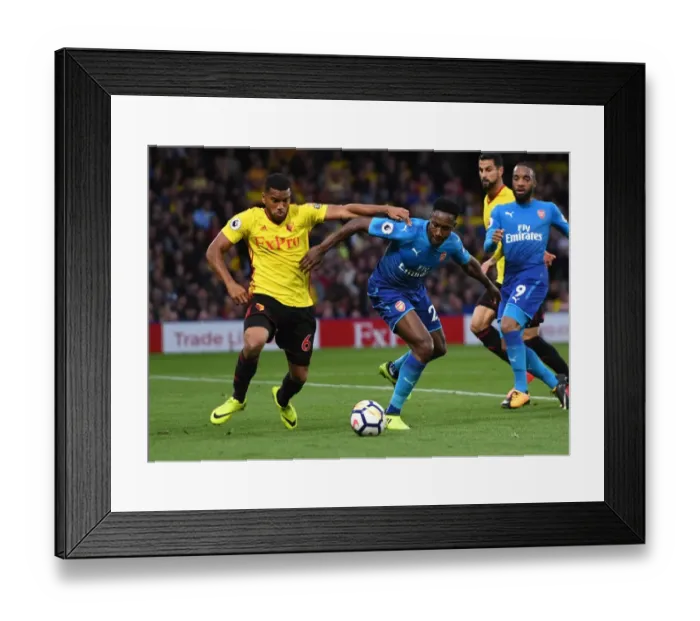 Framed Print : Welbeck vs Mariappa: Intense Battle in Watford v Arsenal Premier League Clash