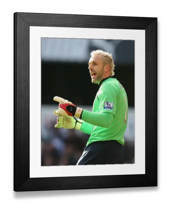 Framed Print : Arsenal's Manuel Almunia Delivers a Clean Sheet: 0-0 Stalemate Against Tottenham in Premier League Rivalry Framed Print : Arsenal's Manuel Almunia Delivers a Clean Sheet: 0-0 Stalemate Against Tottenham in Premier League Rivalry