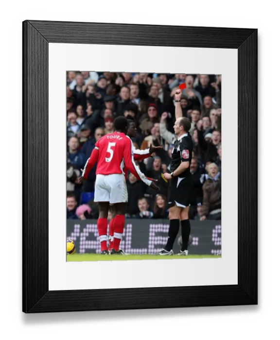 Framed Print : Arsenal's Emmanuel Eboue Receives Red Card from Referee Mike Dean in Barclays Premier League Match against Tottenham Hotspur