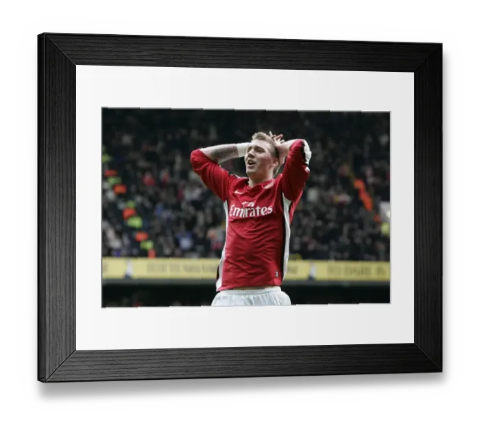 Framed Print : Bendtner's Stalemate: Arsenal vs. Tottenham, Barclays Premier League, 2009