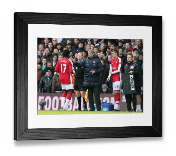 Framed Print : Arsene Wenger the Arsenal Manager gives Alex Song Framed Print : Arsene Wenger the Arsenal Manager gives Alex Song