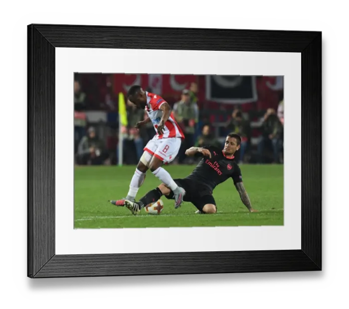Framed Print : Debuchy vs Kanga: Clash in the Europa League Between Red Star and Arsenal