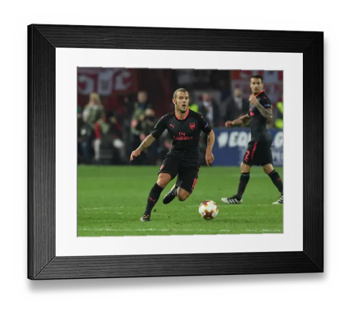 Framed Print : Jack Wilshere: Arsenal's Midfield Maestro Shines in Europa League Clash Against Red Star Belgrade