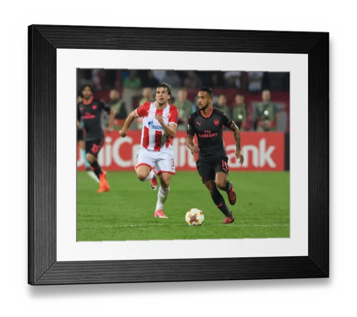 Framed Print : Theo Walcott Outmaneuvers Filip Stojkovic in Arsenal's Europa League Clash vs Crvena Zvezda Framed Print : Theo Walcott Outmaneuvers Filip Stojkovic in Arsenal's Europa League Clash vs Crvena Zvezda