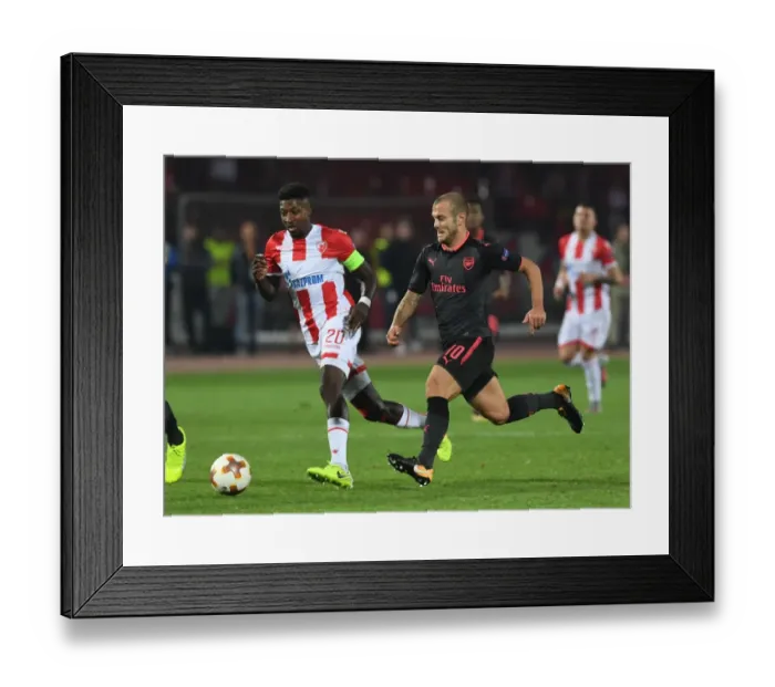 Framed Print : Jack Wilshere Takes on Mitchell Donald: Arsenal vs Crvena Zvezda, UEFA Europa League Framed Print : Jack Wilshere Takes on Mitchell Donald: Arsenal vs Crvena Zvezda, UEFA Europa League