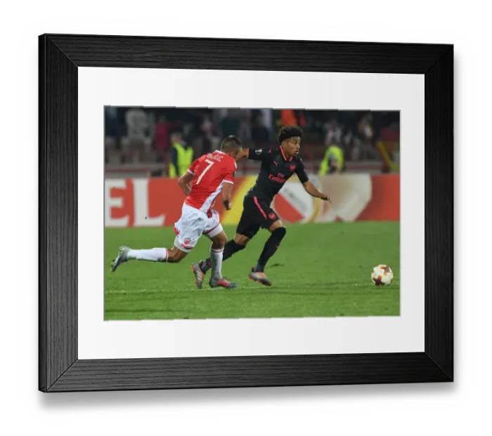 Framed Print : Reiss Nelson vs Nenad Krsticic: Battle at Rajko Mitic Stadium - Arsenal vs Crvena Zvezda, Europa League 2017 Framed Print : Reiss Nelson vs Nenad Krsticic: Battle at Rajko Mitic Stadium - Arsenal vs Crvena Zvezda, Europa League 2017