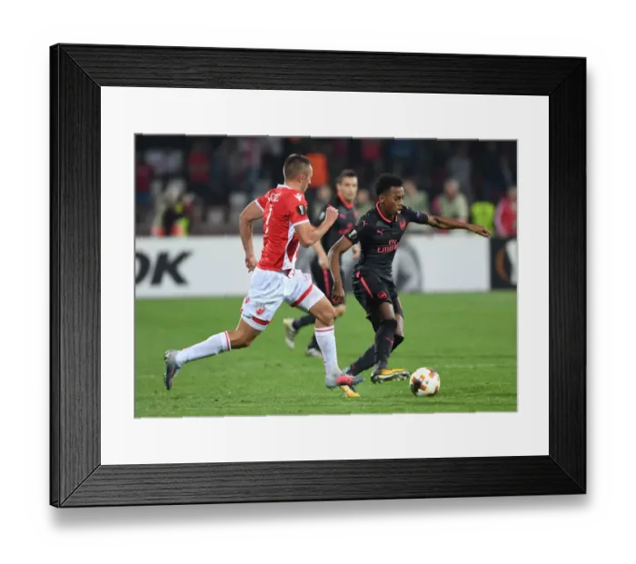 Framed Print : Joe Willock vs. Nenad Krsticic: Battle in the Europa League between Arsenal and Red Star Belgrade