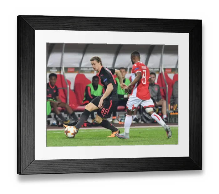 Framed Print : Battle for the Ball: Ben Sheaf vs. Guelor Kanga in Europa League Clash between Crvena Zvezda and Arsenal