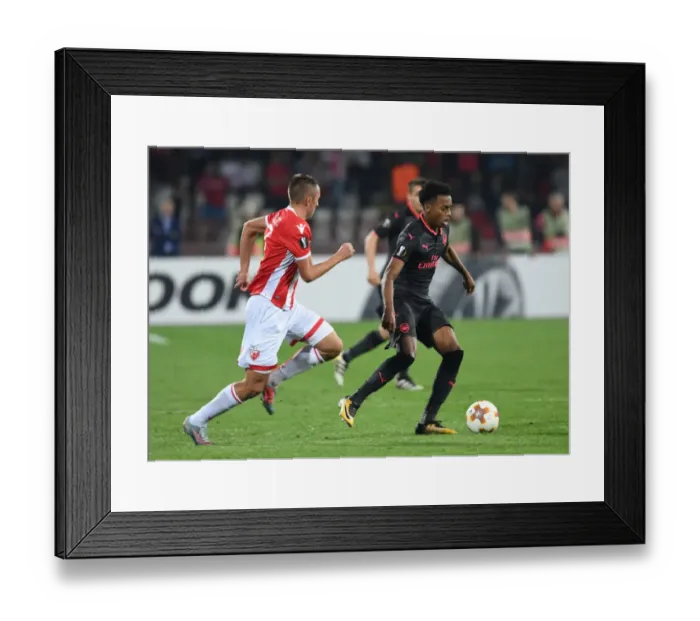 Framed Print : Joe Willock vs. Nenad Krsticic: A Europa League Battle at Rajko Mitic Stadium Framed Print : Joe Willock vs. Nenad Krsticic: A Europa League Battle at Rajko Mitic Stadium