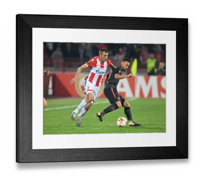 Framed Print : Coquelin vs. Krsticic: Battle in the Europa League between Arsenal's Francis Coquelin and Red Star's Nenad Krsticic