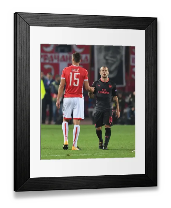 Framed Print : Jack Wilshere and Srdan Babic Exchange Handshakes: Crvena Zvezda vs. Arsenal FC, UEFA Europa League 2017-18