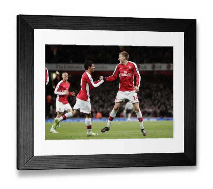 Framed Print : Bendtner and Vela's Jubilant Moment: Arsenal's Unforgettable 4:0 FA Cup Victory Over Cardiff City Framed Print : Bendtner and Vela's Jubilant Moment: Arsenal's Unforgettable 4:0 FA Cup Victory Over Cardiff City