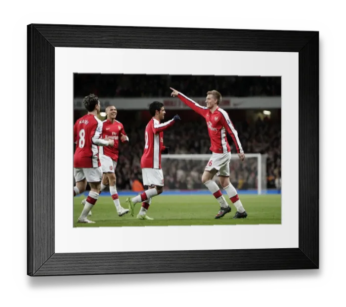 Framed Print : Bendtner and Vela's Double Celebration: Arsenal's Unforgettable 4-0 FA Cup Victory Over Cardiff City Framed Print : Bendtner and Vela's Double Celebration: Arsenal's Unforgettable 4-0 FA Cup Victory Over Cardiff City