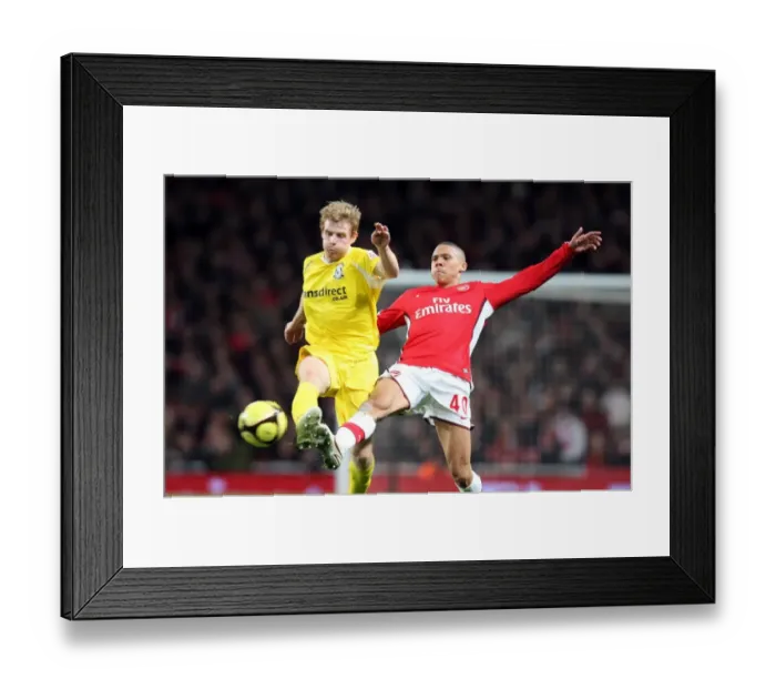 Framed Print : Kieran Gibbs (Arsenal) Chris Burke (Cardiff) Framed Print : Kieran Gibbs (Arsenal) Chris Burke (Cardiff)