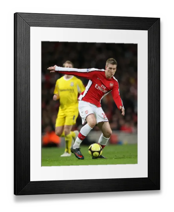 Framed Print : Arsenal's Nicklas Bendtner Scores in Dominant 4-0 FA Cup Win over Cardiff City Framed Print : Arsenal's Nicklas Bendtner Scores in Dominant 4-0 FA Cup Win over Cardiff City