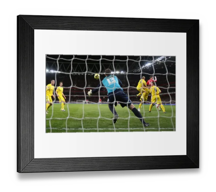 Framed Print : Bendtner's Brilliant Header: Arsenal's 4-0 Crush of Cardiff in FA Cup Framed Print : Bendtner's Brilliant Header: Arsenal's 4-0 Crush of Cardiff in FA Cup