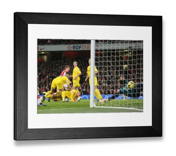 Framed Print : Bendtner's Brilliant Header: Arsenal's 4-0 FA Cup Victory over Cardiff