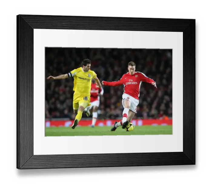 Framed Print : Arsenal's Double Victory: Bendtner Scores Twice in 4-0 FA Cup Win over Cardiff (Joe Ledley) Framed Print : Arsenal's Double Victory: Bendtner Scores Twice in 4-0 FA Cup Win over Cardiff (Joe Ledley)