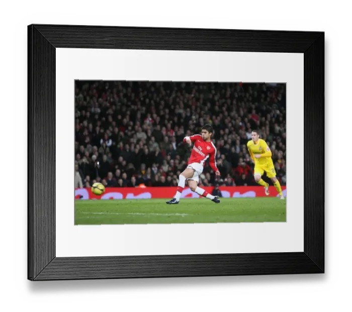 Framed Print : Eduardo shoots past Cardiff goalkeeper Tom Heaton from