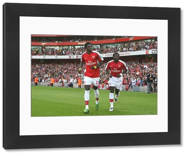 Emmanuel Adebayor and Kolo Toure (Arsenal)