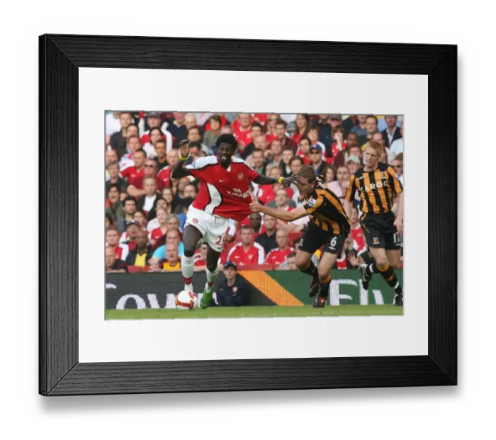 Framed Print : Adebayor vs Turner: Hull City Stuns Arsenal in Premier League, 1-2 Framed Print : Adebayor vs Turner: Hull City Stuns Arsenal in Premier League, 1-2