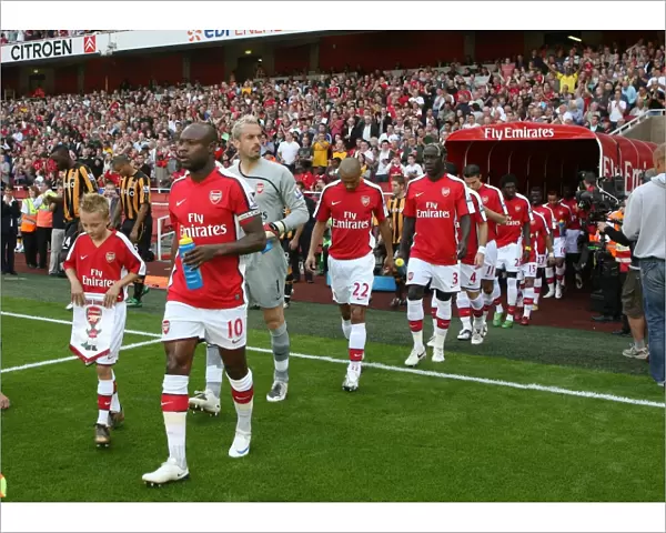 William Gallas (Arsenal) leads the team out