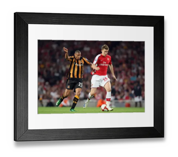 Framed Print : Arsenal's Bendtner vs. Hull's Cousin: A Tight Match at Emirates Stadium, 1:2 in Favor of Hull, Barclays Premier League, 27 / 9 / 08