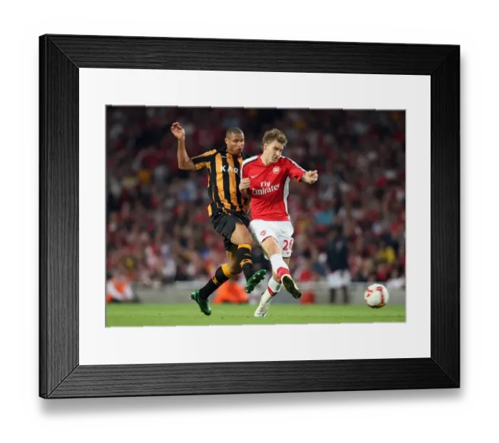 Framed Print : Nicklas Bendtner (Arsenal) Daniel Cousin (Hull) Framed Print : Nicklas Bendtner (Arsenal) Daniel Cousin (Hull)