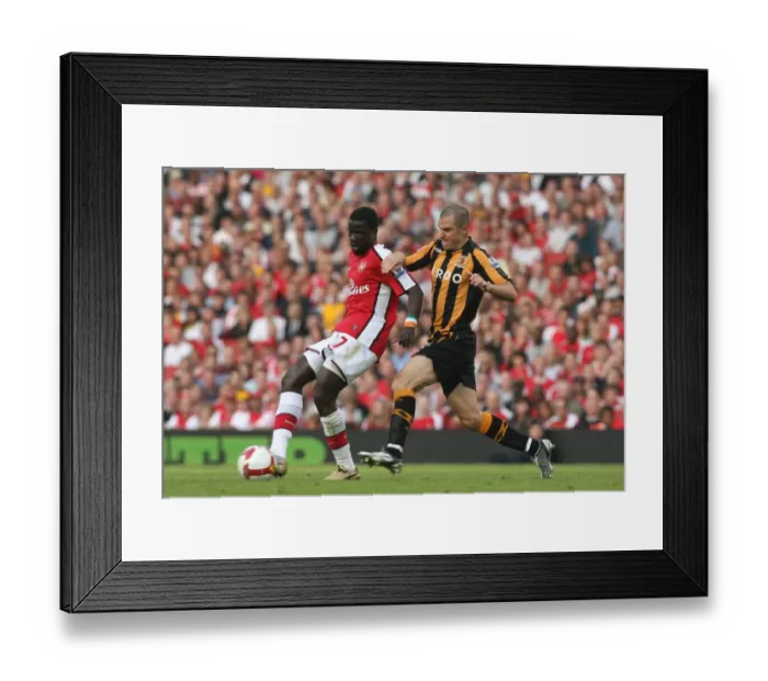 Framed Print : Emmanuel Eboue (Arsenal) Dean Marney (Hull) Framed Print : Emmanuel Eboue (Arsenal) Dean Marney (Hull)