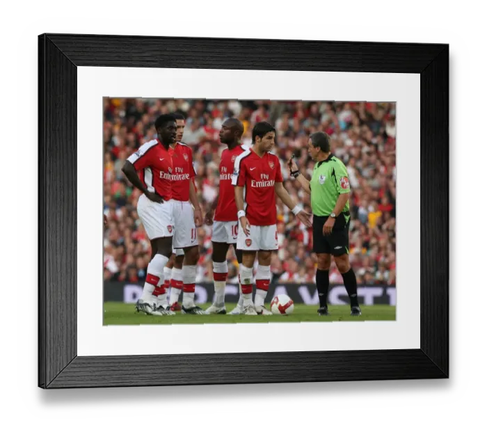 Framed Print : Cesc Fabregas (Arsenal) and referee Alan Wiley Framed Print : Cesc Fabregas (Arsenal) and referee Alan Wiley