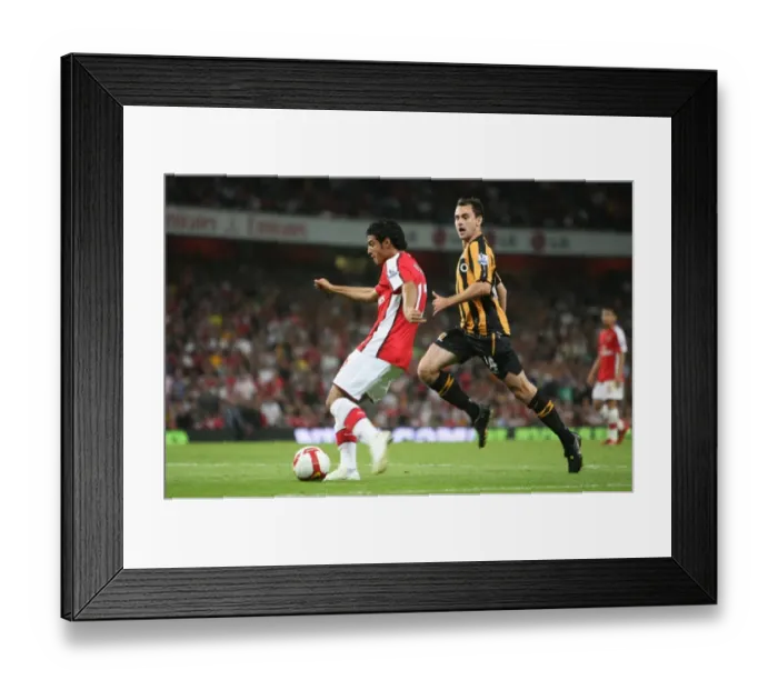 Framed Print : Carlos Vela (Arsenal) Richard Garcia (Hull) Framed Print : Carlos Vela (Arsenal) Richard Garcia (Hull)